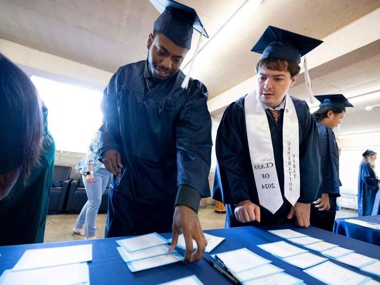 two students at Penn State Abington (near Philadelphia) commencement 